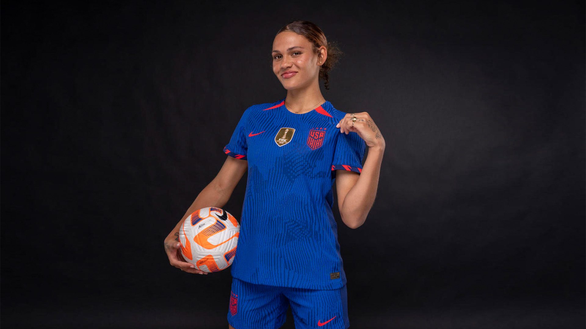 USWNT forward Trinity Rodman shows off the team's new away jersey